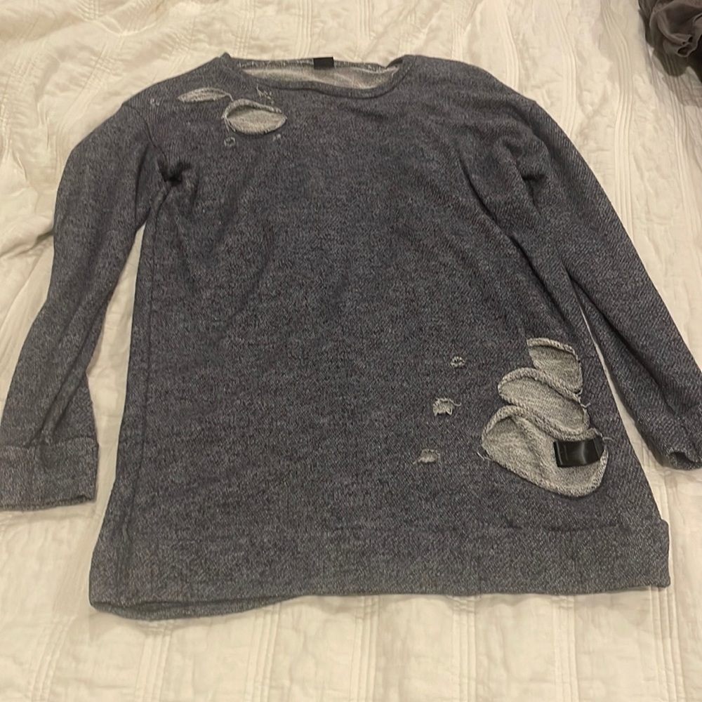 Fun Lounge Shirt bought from a boutique. Holes in front and back.